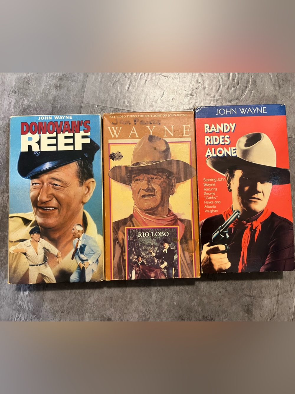 VHS Set of Three John Wayne Movies (Randy Rides Alone, Rio Lobo, Donovan’s Reef)